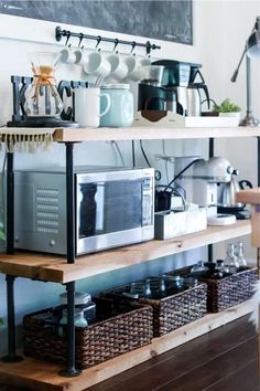 the coffee station is organized and ready to be used as a diy black pipe coffee station