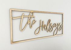 a wooden sign that says the halseys in cursive writing on it