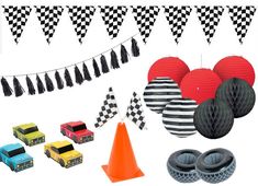 an assortment of party supplies including balloons, cars and decorations for a race car themed birthday party