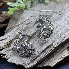 TAKE AN ADDITIONAL 20% OFF THE ALREADY REDUCED SALE PRICE - ADDITIONAL 20% IS DEDUCTED AT CHECKOUT with code SAVE20 The mythical wisdom of a Raven ~ Solid Sterling Silver Earrings The Raven has always created much awe and wonder. It has been a timeless mystery to us. The language it speaks, then by the silence of the brilliant, even cunning raven, it's in silence further deepens our curiosity. Ravens capture our imagination. Every culture has encountered this magical bird. They either revered or Symbolic Earrings With Oxidized Finish For Gift, Symbolic Moon-shaped Earrings For Gift, Celtic Raven, Celtic Earrings, Crescent Moon Earrings, The Raven, Crystal Design, Celtic Jewelry, Moon Earrings