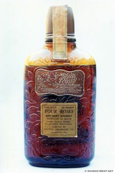 a bottle of four roses syrup on a white background