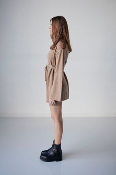 Mini wrap dress in merino wool with tie around waist and subtle bell sleeve. Fall Beige Dress With Belted Cuffs, Beige Fall Dress With Belted Cuffs, Chic Loungewear Dress With Tie Waist, Elegant Dresses With Tie Waist For Loungewear, Mini Wrap, Mini Wrap Dress, Bell Sleeve, Florence, Merino Wool