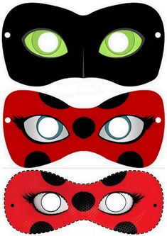 three masks with green eyes and black cat's eyeballs on the top one