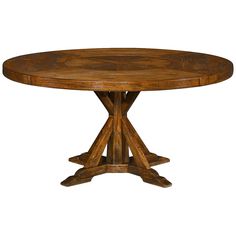 a round wooden table with four legs