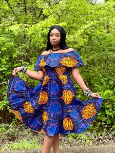 ✨ Infuse your style with the vibrant hues and cultural richness of Ankara fabric in this stunning midi dress. ✨ Crafted with precision and style in mind, this Traditional Kente Midi Dress features a figure-flattering silhouette that accentuates your curves while offering comfort and grace. The fit and flare design effortlessly transitions from day to night, making it a versatile addition to any wardrobe. Whether you're attending a daytime event or a sophisticated evening soirée, this dress exude Yellow Bohemian Knee-length Midi Dress, Multicolor Vibrant Print Knee-length Dress, Vibrant Multicolor Print Knee-length Dress, Multicolor Knee-length Dress With Vibrant Print, Bohemian Blue Dress With Colorful Pattern, Blue Bohemian Dress With Colorful Pattern, Multicolor Midi Dress With Vibrant Print, Vibrant Multicolor Print Midi Dress, Purple Maxi Dress With Vibrant Print