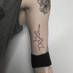 a person with a tattoo on their arm