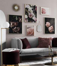 a living room filled with furniture and pictures on the wall above it's coffee table