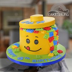 a birthday cake made to look like a lego hat for a child's birthday