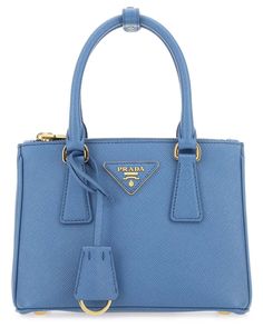 Cerulean Blue Leather Handbag from Prada Blue Saffiano Leather Bag For Formal Occasions, Designer Blue Shoulder Bag For Shopping, Blue Saffiano Leather Bag For Office, Blue Saffiano Leather Office Bag, Blue Saffiano Leather Bag For Everyday Use, Luxury Blue Shoulder Bag, Classic Blue Saffiano Leather Bag, Blue Saffiano Leather Top Handle Bag, Blue Saffiano Leather Evening Bag