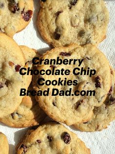 a pile of cookies with cranberry chocolate chip cookies in the middle and text overlay