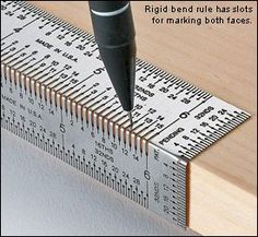 a ruler with a pen on top of it and the words, right bend rules has slots for marking both sides