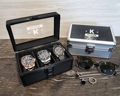 "Celebrate special occasions with our high-quality aluminum watch box. The perfect gift for birthdays, graduations, anniversaries, and more, it's designed with a military-like style, embodying rugged sophistication. ⭐ Made with a glass lid, this watch box lets you add a personal touch by engraving custom content. The grooved exterior, featuring horizontal lines, offers a sleek and minimalist look while ensuring structural integrity. ⭐ Available in both 3 and 5 slot options, our watch box caters to different needs. The army-inspired designs showcase your loved one's unique personality and interests. Make their day memorable with a gift that combines style and functionality. ⭐  Material: Aluminum exterior with a glass lid ⭐  Size: 3 slots - 6.7\"x4.3\"x3.3\"; 5 slots - 11.4\"x4.3\"x3.3\" --- Durable Silver Watch Accessories For Gift, Rectangular Silver Watch Accessories For Gifts, Silver Rectangular Watch Accessories For Gifts, Durable Black Watch As Gift, Rectangular Stainless Steel Watch Accessories For Gifts, Silver Rectangular Watch Accessories As Gift, Silver Watches For Father's Day Gift, Personalized Stainless Steel Watch Accessories For Gift, Customizable Silver Watch Accessories For Gift