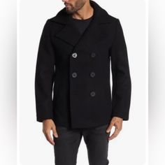 This Wool Blend Coat Features Classic Details For A Stylish Peacoat Look. Fit: This Style Fits True To Size. - Notch Collar - Long Sleeves - Front Double Breasted Closure - 2 Front Welt Pockets - Wool Blend Construction - Lined. Black Outerwear With Double Button Closure For Fall, Black Pea Coat With Double Button Closure, Winter Black Single-breasted Peacoat, Black Long Peacoat With Pockets, Black Double-breasted Peacoat For Winter, Fall Black Single-breasted Peacoat, Black Long Sleeve Peacoat For Fall, Double-breasted Black Pea Coat For Business, Black Double-breasted Pea Coat For Business