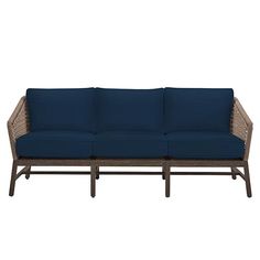 an outdoor sofa with dark blue cushions and wicker frame, viewed from the front