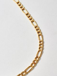 14Kt Yellow Gold Hollow Figaro Chain Width: 4.7mm Lobster Clasp Closure Available in 16" or 18" Lengths Made in Italy Luxury Figaro Chain Link Necklace, Luxury 14k Gold Figaro Chain Necklace, Yellow Gold Figaro Chain Bracelet With Rectangular Links, Luxury Gold Bracelet With Figaro Chain, Gold-tone Figaro Chain Jewelry With Oval Link, Yellow Gold Figaro Chain Link Bracelet, Gold-tone Oval Link Figaro Chain Jewelry, Yellow Gold Figaro Chain Bracelet, 14k Gold-tone Jewelry With Figaro Chain