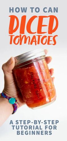 a hand holding a jar of pickled tomatoes with the title how to can pickled tomatoes