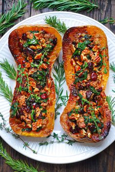 two slices of stuffed sweet potatoes on a white plate