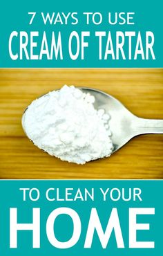 a spoon filled with white cream on top of a wooden table next to a sign that says, 7 ways to use cream of tartarr to clean your home