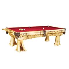 a pool table made out of logs with red cloth on the top and two legs