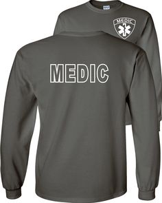 Emergency Medical Services Medic T-Shirt Short, Long, Polo, Performance, Quarter Zip Navy Pullover, Full-Zip Navy Hooded Jacket 100% Love It Guarantee! Fair Game brand apparel. Print to order in Seaside, Oregon United States. Available in t-shirts, long sleeves, polos, performance, quarter-zips, full-zips and hoodies. Gildan & Jerzees Brand Unisex Sizing-pre-shrunk All 100% cotton Design will appear smaller on larger size shirts. To view apparel size charts and apparel specifics clink on lin Gray Long Sleeve Pre-shrunk T-shirt, Emergency Medical Responder, Medical Health Care, Emergency Medical Services, Video Game T Shirts, Wolf Shirt, Wolf T Shirt, Birthday Party Shirt, Medical Services