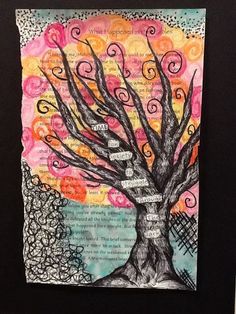 an art journal page with a tree on it