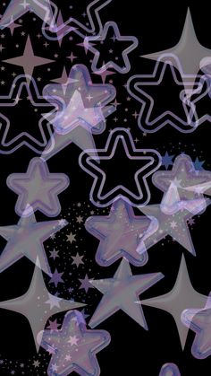 an image of many stars in the sky with light effects on black and purple background