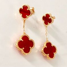 New. 2 Quatrefoil Clover Motif With Both Sides Red Carnelian Enamel Color. 18k Yellow Gold Plated On Stainless Steel High Quality . Water Resistant. Does Not Tarnish. Vintage Style Stud Drop Earrings Perfect For Everyday Wear If You Love Fashion Luxury. Unisex. Earrings, 2 Quatrefoil Clover Motifs, 18k Yellow Gold Plated, Carnelian Red Color Enamel . Length: 2 Inches. Luxury Red Flower Shaped Jewelry, Luxury Red Flower-shaped Jewelry, Luxury Red Dangle Jewelry, Elegant Red Flower-shaped Jewelry, Luxury Red Pierced Jewelry, Fine Jewelry Red Flower-shaped Jewelry, Fine Jewelry In Red Flower Shape, Red Flower Shaped Fine Jewelry, Red Flower Shaped Jewelry For Formal Occasions