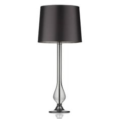 a lamp with a black shade on the bottom and a silver base, sitting on a white background