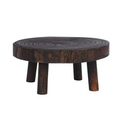 a wooden stool with an intricate design on the top