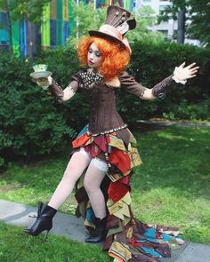 a woman dressed up as a mad hatter