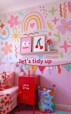 a child's bedroom decorated in pink and green