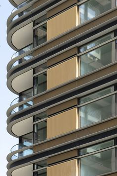 a tall building with balconies on the sides