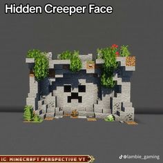 the hidden creeper face is made out of rocks and plants, with text overlaying it