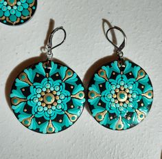 - Teal and Gold On Lightweight Wood - Stainless Steel Lever Back Hardware - Hand Painted  - Varnished for Durability - Free Shipping In US On Orders over $35 Hand Painted Turquoise Drop Earrings, Green Dangle Earrings With Artistic Design, Green Artistic Dangle Earrings, Turquoise Clip-on Earrings As Gift, Green Earrings With Artistic Design For Gift, Artistic Turquoise Earrings With Ear Wire, Hand Painted Turquoise Bohemian Earrings, Artsy Turquoise Nickel-free Earrings, Handmade Green Round Clip-on Earrings