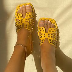 New Cape Robbin Golden Yellow Sandal Accentuated In Gold Spikes And Lined With Gold Button Details . Plush And Cushioned Instep Super Comfy And True Fit Wide Foot Friendly Save 20% With Code Crav20 Www.Cravofficial.Com Flat Sandals With Spikes For The Beach, Yellow Round Toe Slides For Beach, Flat Studded Sandals For Spring, Spring Flat Sandals With Studs, Flat Spiked Sandals For The Beach, Flat Beach Sandals With Spikes, Flat Studded Sandals For Summer, Flat Spike Sandals For The Beach, Spring Flat Studded Sandals