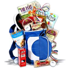 a blue and white bag filled with lots of different types of things to buy from the store