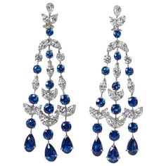 A FABULOUS pair of sapphire and diamond chandelier earrings. 24.68 carats of blue sapphire 13.36 carats of diamonds Platinum The perfect timeless design for an impressive yet wearable diamond earring with a pop of color! Vintage Sapphire Earrings, Rings Sapphire, Pearl Chandelier Earrings, Earrings Sapphire, Diamond Chandelier Earrings, Diamond Chandelier, Ruby Rings, Multi Gemstone Ring, Earrings Chandelier