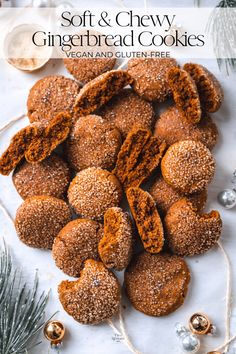 soft and chewy gingerbread cookies on a white plate with christmas decorations around it