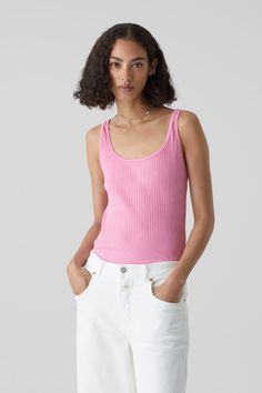 Made of pure organic cotton and elastane: ribbed tanktop with a slim fit, wide round neckline and straight hem. Slim fit Length: ca. 62 cm / 24.4” (size S) Model 1 (1,80 m / 5'10'') wears size S Model 2 (1,78 m / 5'10'') wears size S Made in Turkey Eco aspect: organic cotton 95% Cotton (organic), 5% Elastane Style Nr. C95044-42U-22 Pink Lilies, Ruby Tuesday, Pink Lily, Ribbed Tank Tops, Round Neckline, Ruby, Organic Cotton, Lily, Slim Fit