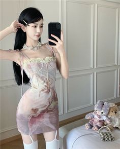 Treat yourself to a modern-day Renaissance outfit with this Angelcore-print fitted mini dress! Features a lace-accented fitted mesh bodice, angel print and adjustable shoulder straps. Get ready to transform into a heavenly angel - all eyes will be on you! Size M Bust: 80-82cm Waist: 64-68cm Hips: 88cm Length: 72cm Size L Bust: 82-84cm Waist: 66-70cm Hips: 92cm Length: 73cm Angelcore Clothes, Angelic Outfits, Angel Fashion, Angel Print, Angel Dress, Fashion Barbie, Fitted Mini Dress, Custom Made Clothing, Dress Measurements