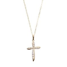 "Accentuated with cubic zirconia stones, this 10k gold cross pendant necklace beautifully conveys your beliefs. Comes in a gift box.PENDANT DETAILS Pendant length: .93 in. Chain length: 18 in. Clasp: spring-ring Metal: 10k gold Features: 14k gold-filled chain CUBIC ZIRCONIA DETAILS Total weight: 1/3 ct. Shape: round Setting: prong Gemstones may have been treated to enhance their appearance. Special care may be required. Size: 18"". Color: White. Gender: female. Age Group: adult." Cheap Cross Pendant Necklaces For Jewelry Making, Gift Cross Necklace With Diamond Accents In Cubic Zirconia, Gift Cross Necklace With Diamond Accents, Classic Cubic Zirconia Cross Necklace For Gift, Classic Cubic Zirconia Cross Necklace As Gift, Zirconia Necklace, Gold Cross Pendant, Ring Metal, Gold Cross