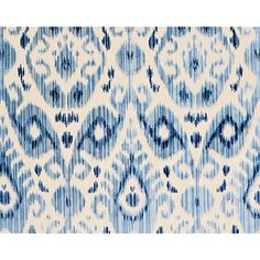 a blue and white pattern on fabric