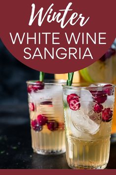 Two glasses of delicious, refreshing white wine sangrai with pitcher of sangria in background. Winter Sangria Recipes White, White Cranberry Sangria, White Christmas Sangria Recipe, Wine Punch Recipes, White Wine Drink, Winter Sangria Recipes, Holiday Sangria Recipes, Wine Spritzer Recipe, Christmas Sangria Recipes