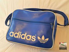 An original vintage Adidas sport bag from the 1980's. An absolute gem for vintage fans. Size:  40 x 30 x15 H x W x D (all dimensions are in cm) Materials: artificial leather, textile, metal condition: The bag is in excellent vintage condition, depending on its age.  The zippers work perfectly. Signs of use. See pictures for details. Shipping: - My shop ships worldwide. - If you like, select the "EXPRESS  shipping" option in the order process to get faster shipping. - You can see the shipping pri Get Faster, Adidas Bags, Vintage Sport, Sports Bags Gym, Adidas Vintage, Vintage Fans, Sports Gym, Casual Tote, Vintage Casual