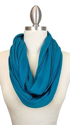 a mannequin with a blue scarf on it