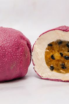 the fruit is cut in half and ready to be eaten