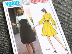 an image of a woman in a dress on the cover of a sewing pattern book