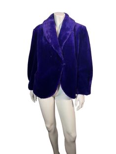 "Really cool plush faux fur coat from the late 1980s by Couture Helene. The coat has the rounded 80s shape and a single hook closure in front. There are hidden side pockets. Lined in purple satin. Excellent vintage condition. It's marked a US size 6. Measurements: Shoulder to shoulder 20\", Bust 42\", Waist 42\", Length 26\" Please be sure to check out our Policies page. We cannot accept returns if an item does not fit, so please ask questions prior to purchase. Thanks! To view our entire vintag Purple Couture, Faux Fur Short Coat, Short Faux Fur Coat, Crochet Unique, Purple Satin, Violet Purple, Short Coat, Faux Fur Coat, Vintage Shops