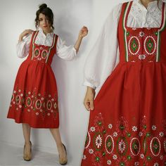 Trrachten Dirndl floral embroidery Dress / Embroidered Dirndl / Mid length Folk Austrian dress / Oktoberfest dress / Size 40 Brand: Eger Dirndl Size: 40 (please check the measurements to make sure it will fit you). Measurements, flat / approximate measurements: Overall length: 110 cm (43.30'') Bust: 46 cm x2 (18.11'' x2) Waist: 40 cm x2 (15.74'' x2) Model in the photos is size 8UK/4US; 164 cm/5'5''  Material: cotton Condition: very good vintage condition (small fixed area on the skirt). The blou Red Floral Embroidered A-line Dress, Red Folk Style Dress With Floral Embroidery, Red Folk Embroidered Dress With Floral Design, Holiday Red Embroidered Dress, Red Folk Embroidered Dress For Spring, Red Folk Dress With Floral Embroidery, Red Embroidered Dress For Christmas, Red Embroidered Christmas Dress, Red Folk Style Dress For Spring