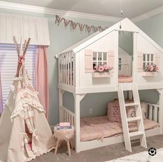 a white bunk bed with pink curtains in a child's room next to a teepee tent